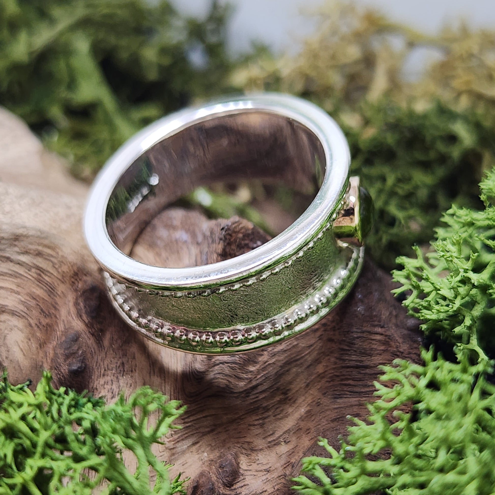 Handmade Sterling silver, gold and Peridot (August birthstone)ring. Size P1/2 but can be altered a little either way, hallmarked and Free UK postage.