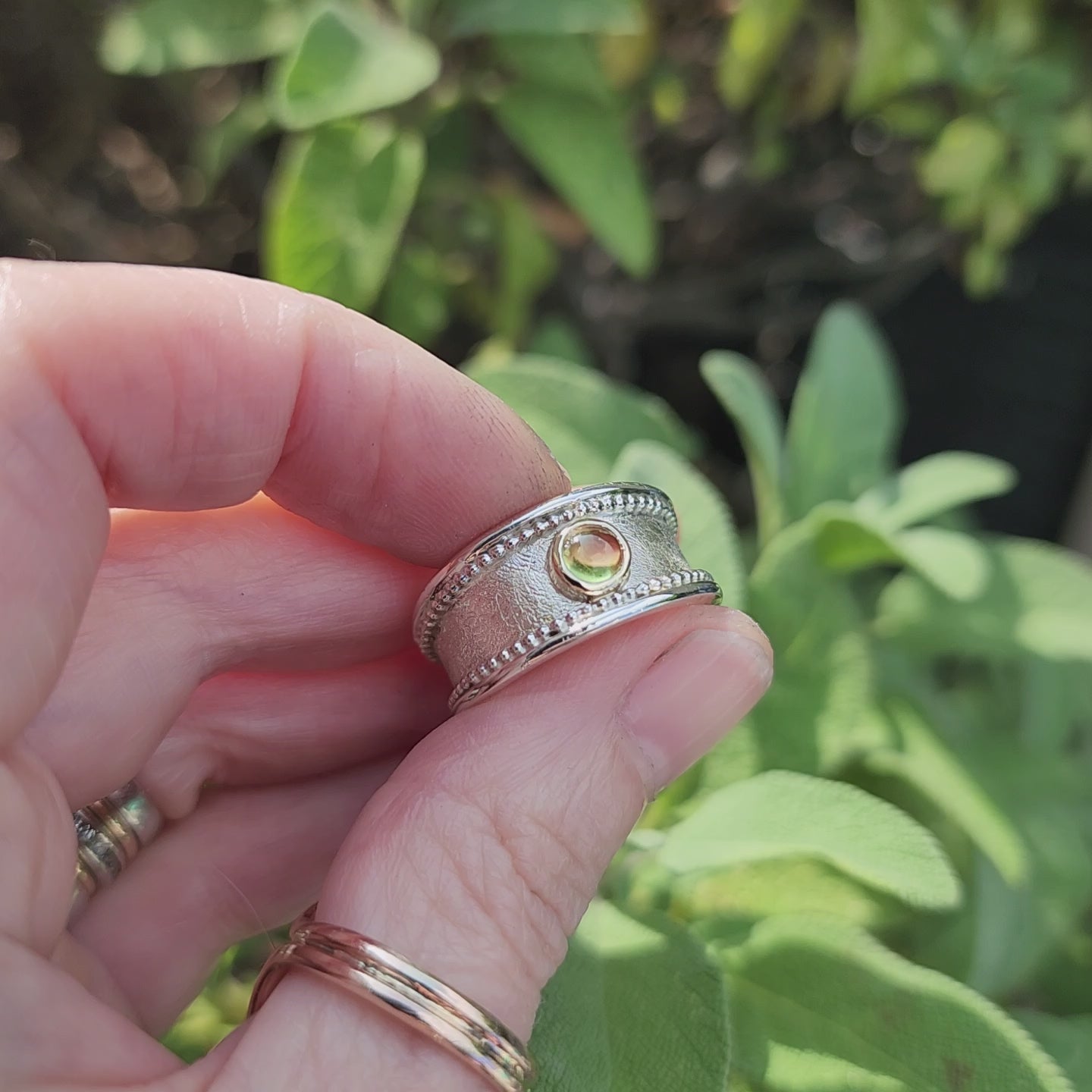 Handmade Sterling silver, gold and Peridot (August birthstone)ring. Size P1/2 but can be altered a little either way, hallmarked and Free UK postage.